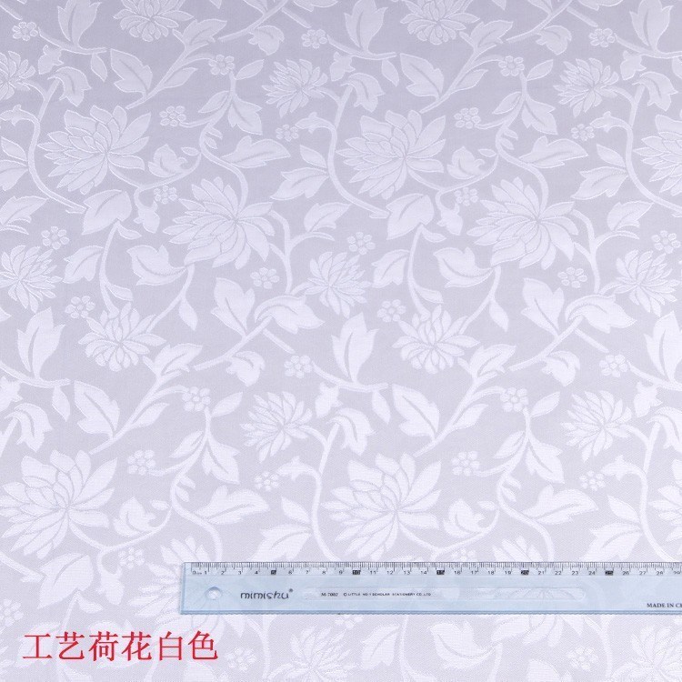 厂家现货供应全涤演出服戏服婚礼婚庆包装盒相册欧式白色提花布料