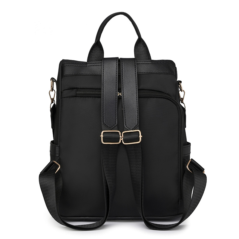 Comercio exterior nueva dama casual nailon mochila antirrobo moda borla color de contraste mochila de viaje de gran capacidad al por mayor