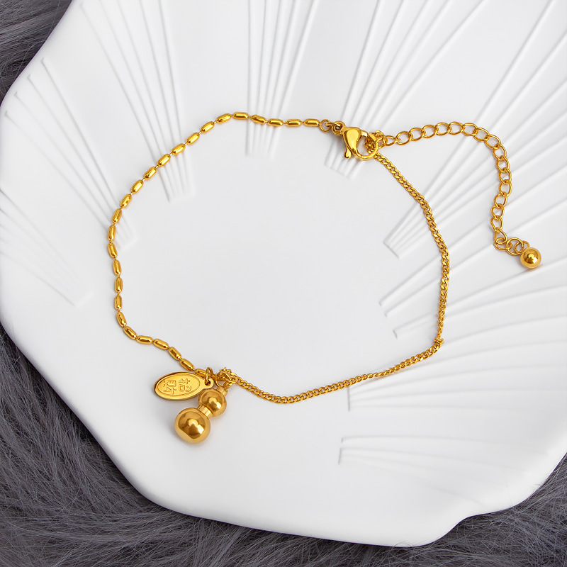 Wenjian 2022 nueva pulsera de acero de titanio japonés y coreano de la suerte de tobillo redondo nicho femenino no se desvanece pequeña calabaza colgante pie