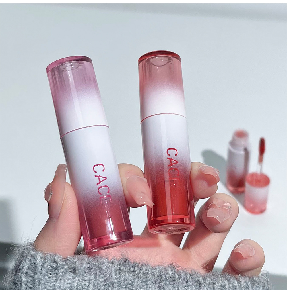 CACE Cold Extract Wind chime Mirror Lip Gloss moisturizes the chubby lips with a water-like luster that doesn't stick to the cup. Pink lip gloss for cross-border use undefined