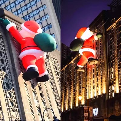 Fabricante de modelos inflables navideños abre sus puertas con modelos inflables de árbol de Navidad, Papá Noel trepando por la pared, muñeco de nieve, tren y arco de dibujos animados.