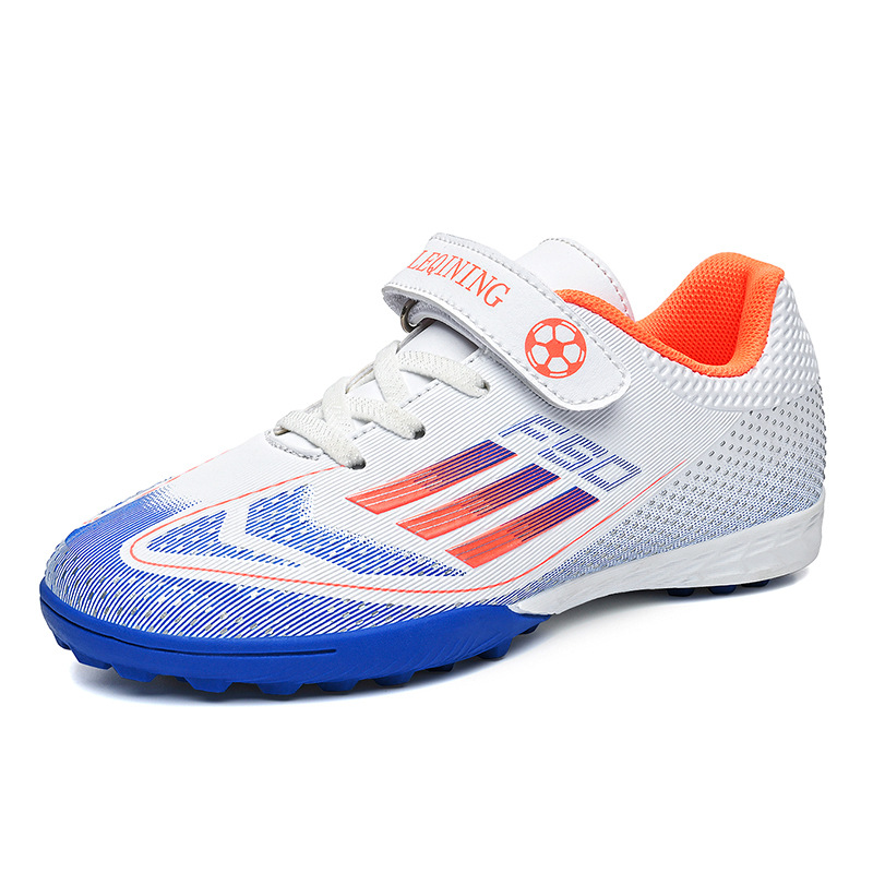 Nuevos niños transfronterizos niños y niñas transpirables cómodos deportes casuales zapatos de fútbol de clavos de césped estudiantes