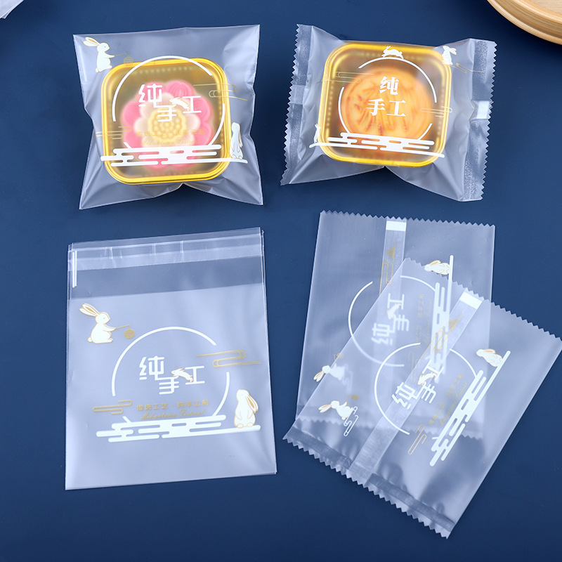 Mid-Autumn Mooncake Mooncake Self-Sealing Self-Adhesive Packaging Bag Ice Skin Flow Egg Yolk Pure Handmade Machine-Sealed Transparent Bag 100g Mid-Autumn Mooncake Mooncake Self-Sealing Self-Adhesive Packaging Bag Ice Skin Flow Egg Yolk Pure Handmade Machine-Sealed Transparent Bag 100g