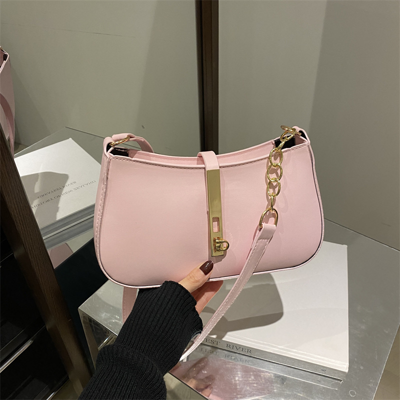 Bolso simple coreano para mujeres otoño / invierno 2024, nuevo estilo de moda retro bolso de brazo francés, textura exterior, bolso de lujo ligero para mujeres.
