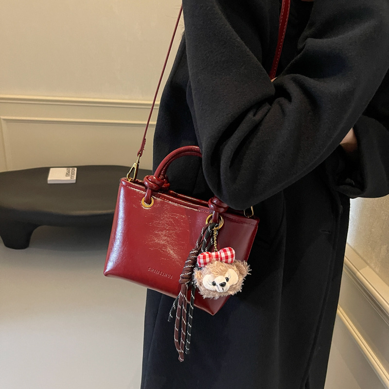 Otoño y invierno Meirad bolsos de mujer 2024 nueva moda moda bolsos de cubo de mano alta sensación de mochila versátil