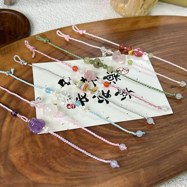 Original Chinese-style handmade DIY woven bracelet with natural pink crystal, Hetian jade, and agate, featuring a cute cartoon design