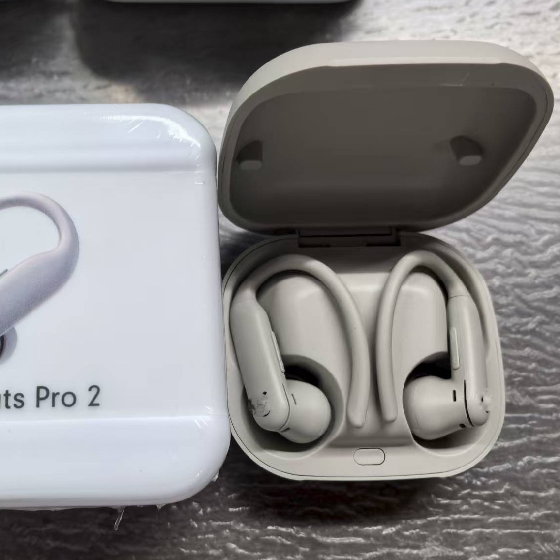 Nuevos auriculares Bluetooth inalámbricos Huaqiang NorthPower Pro2 con auriculares deportivos de ventana pop-up con marca B