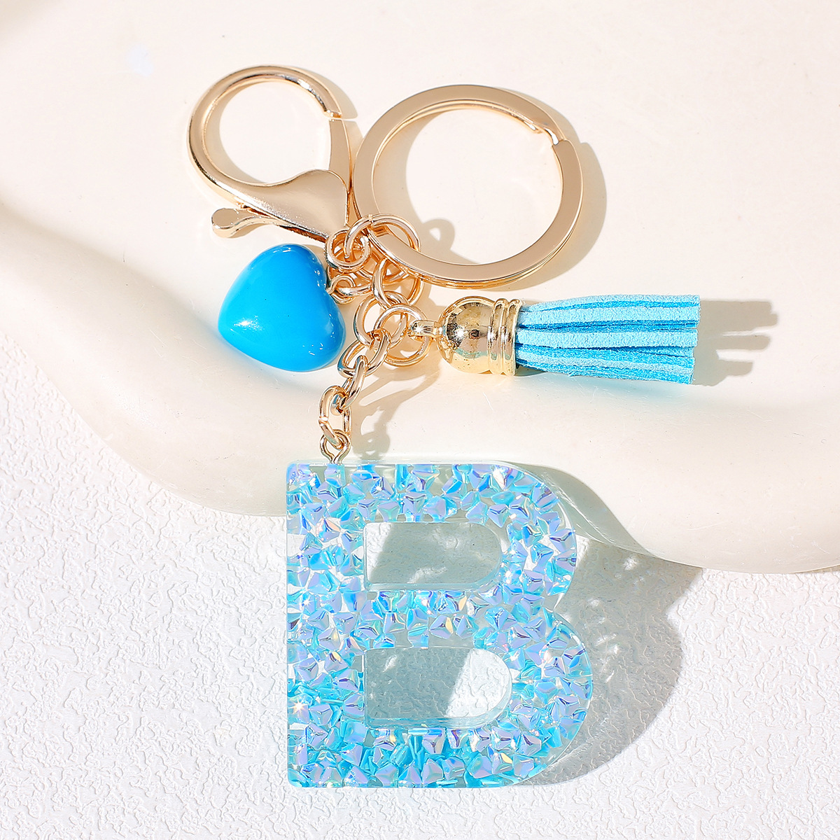 Nuevos productos azules de amor con frascos de letras lindos enclavadores decoraciones europeas y americanas populares llaveros damas