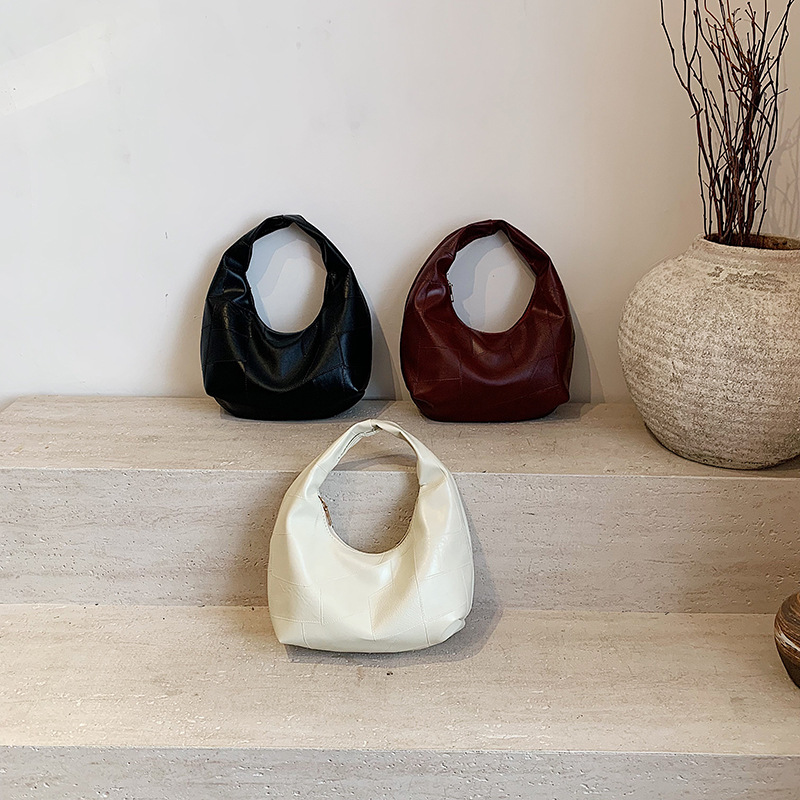 Bolsa de nube estilo minimal pliegue de la axila de la niña pliegue bolsa grande 2025 principios de primavera nuevo bolso de hombro mujer