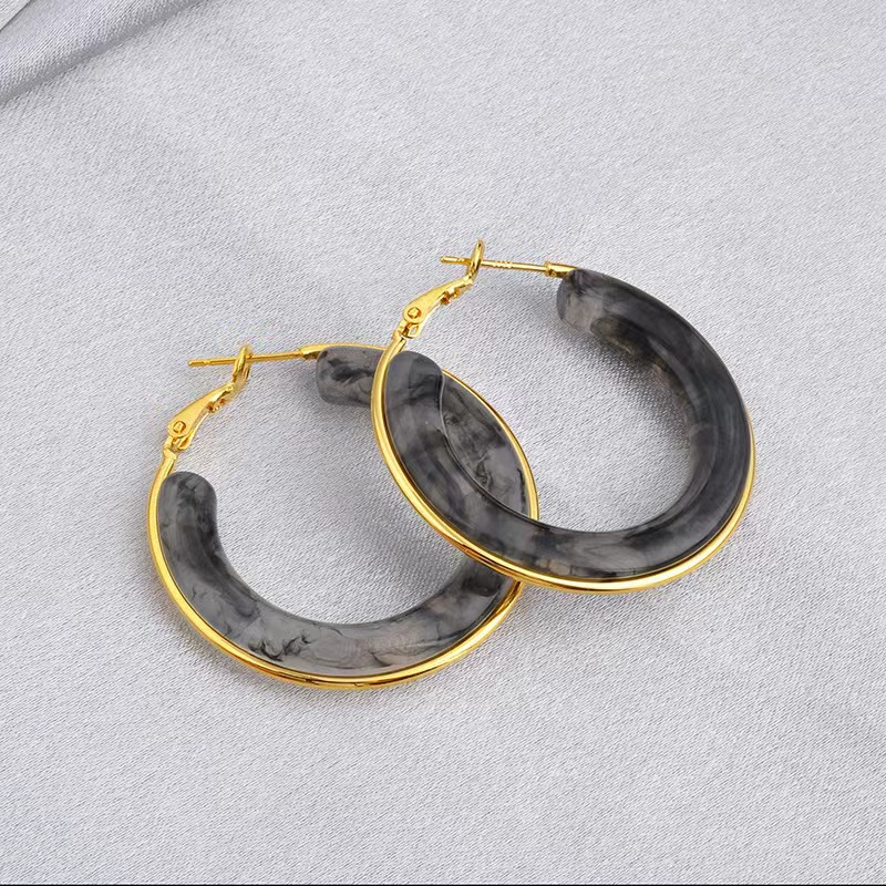 Сет earrings? The original: "Retro brand earrings stainless steel, European style, gradient"