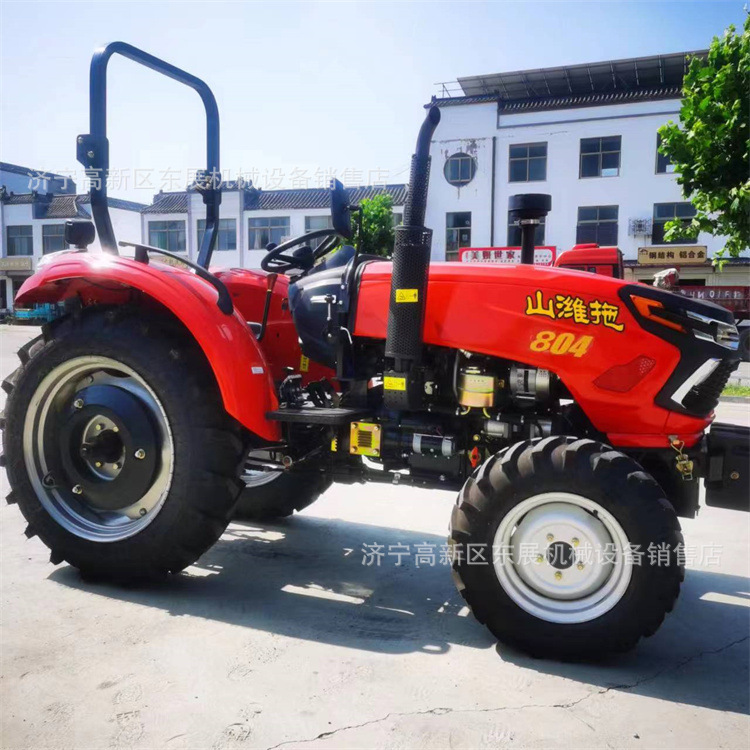 现货供应70马力农用拖拉机 华夏四驱农用拖拉机 旋耕犁地耙地机