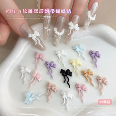 二重リボン付きの蝶結びのネイルアクセサリーの柔らかい彫刻の白黒のピンクの青い紫色の大きいドリルの樹脂は甲の装飾品の卸売りを装います。