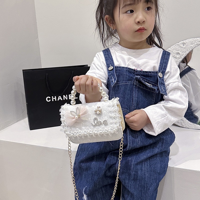 Nuevo tipo de bolso para niños, moda perla portátil, bolso de hombro de la princesa Aisha, estilo extranjero, bolso de hombro para niñas lindas