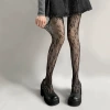 Black fishnet stockings with small white flowers