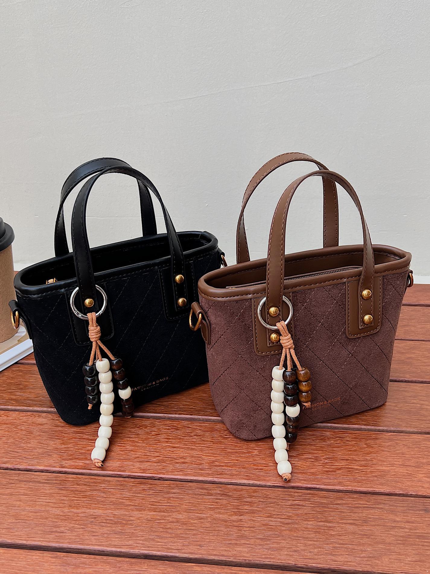 Transfronterizo retro gamuz bolsas de cubo de mano para mujeres 2025 nuevo estilo universal