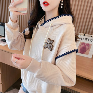 This year's popular jacquard sweater women's spring and autumn thin foreign-style age-reducing bear bright line decorative hooded junior high school top
