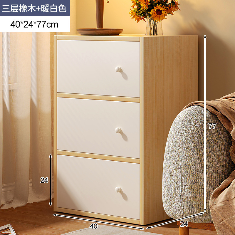 Salón de estar de viento de crema junto al sofá armario de almacenamiento armario de almacenamiento armario de dormitorio armario pequeño armario de cajón