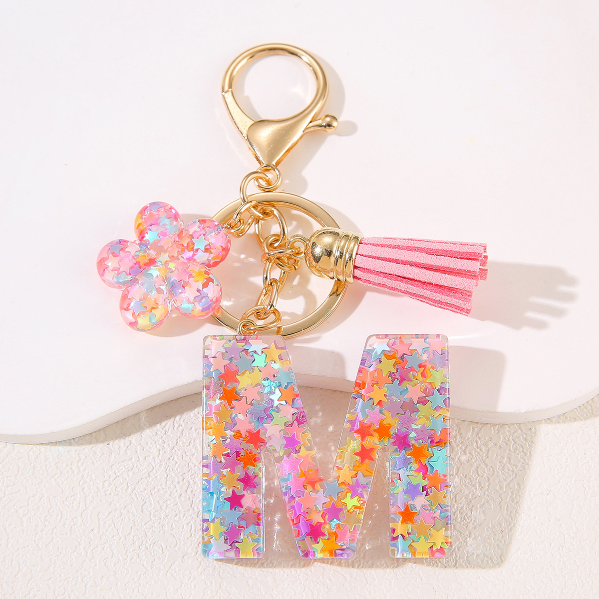 Un nuevo llavero flor de goteo de goma esquinilla 26 letras bolsos colgante llavero accesorios Yiwu
