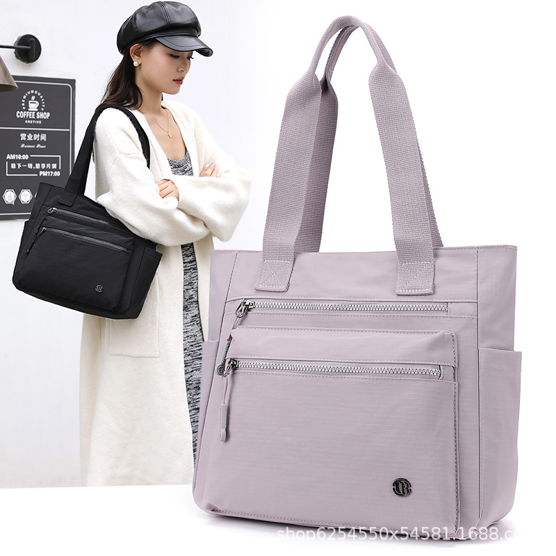 Capacious waterproof solid color nylon one-shoulder bag