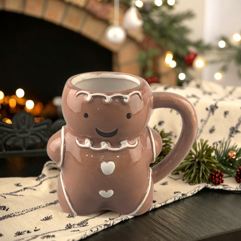 Spot Navidad Cerámica linda de dibujos animados Gingerbread Man Creative Taza de Navidad de alto valor Taza de café con leche
