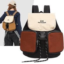 简约拼色水桶背包大容量休闲旅行双肩包街拍户外登山轻便书包跨境