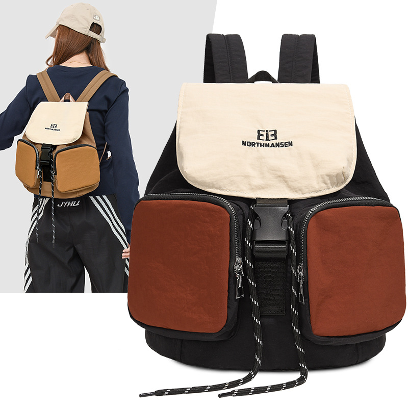 简约拼色水桶背包大容量休闲旅行双肩包街拍户外登山轻便书包跨境