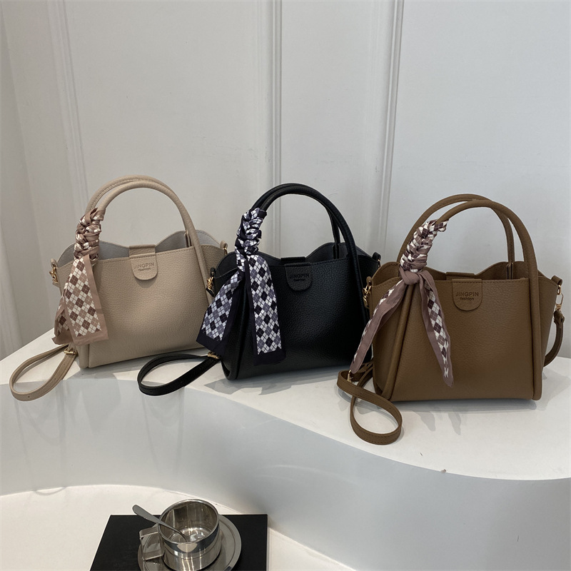 2024 invierno nuevo bolso de mujer moda simple bolso de cubo bolso de mano mujer nuevo viaje de la bolsa de la cesta de la colza