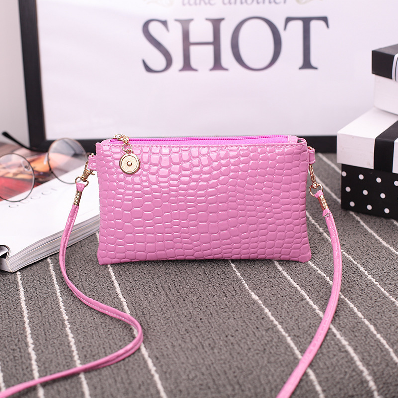Una bolsa de mujer, bolso de moda 2024 bolso de hombro de mujer, bolso de tela de cocodrilo, bolso de cambio de teléfono móvil
