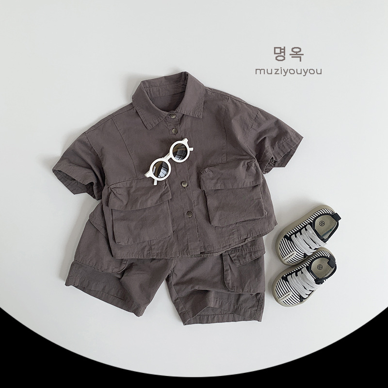 Ropa para niños Camisas de color sólido para niños y niñas 2025 primavera y verano nuevos niños japoneses y coreanos de manga corta de algodón fino ropa de trabajo superior