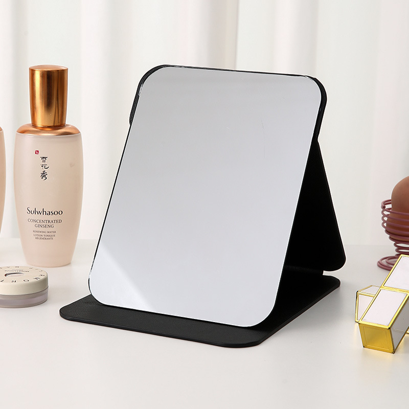 Espejo plegable de cuero PU Dormitorio de estudiantes Espejo de maquillaje de belleza de estilo princesa Espejo de tocador simple de escritorio para el hogar