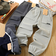 厂家直供中大男童冲锋裤户外梭织软壳裤内里复合万粒绒P运动裤