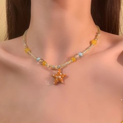 夏のドーパミンイエローヒトデビーズネックレス、女の子の海辺のリゾート風鎖骨チェーンアクセサリー、リゾート風ネックレス