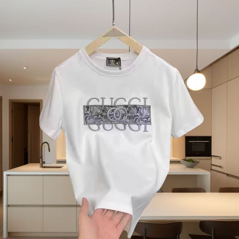 2025夏の対外貿易の新型の重いポンドの純綿の半袖のtシャツの男性の丸首のプリントの潮流のゆったりしている百合の上着