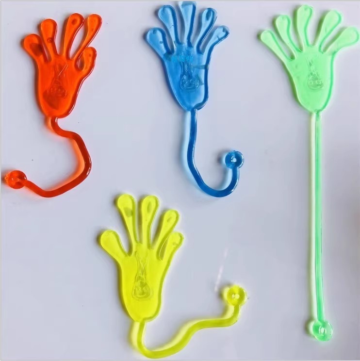Juguetes nostálgicos para niños elásticos al por mayor palma pegajosa extensible palma escalada de pared palma de juguetes de toda la persona