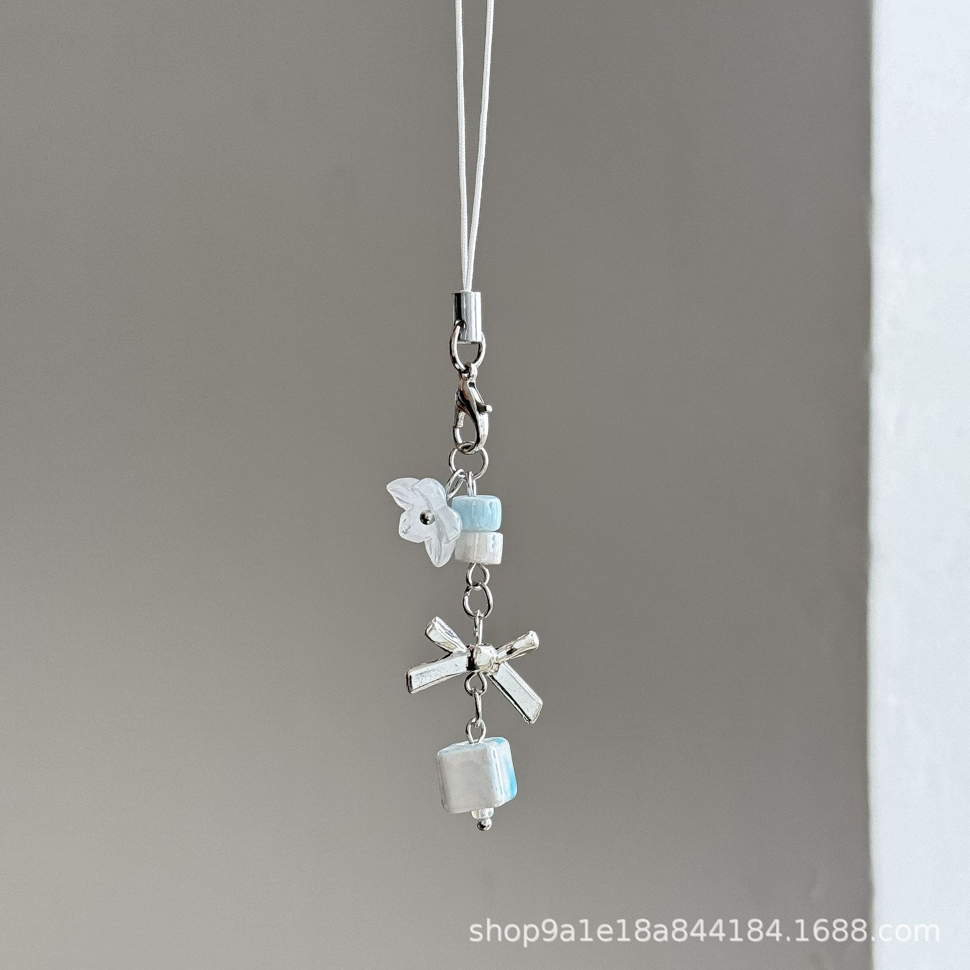 Cute Ins Style Bow Mobile Phone Chain Short Suzuki Orchid Goon Chain Pendant Joker Bag Hanging Ceramic Hanging Ornaments