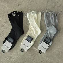 新品miumiu春秋款双针蝴蝶结装饰高品质竹纤维吸汗透气中筒女袜