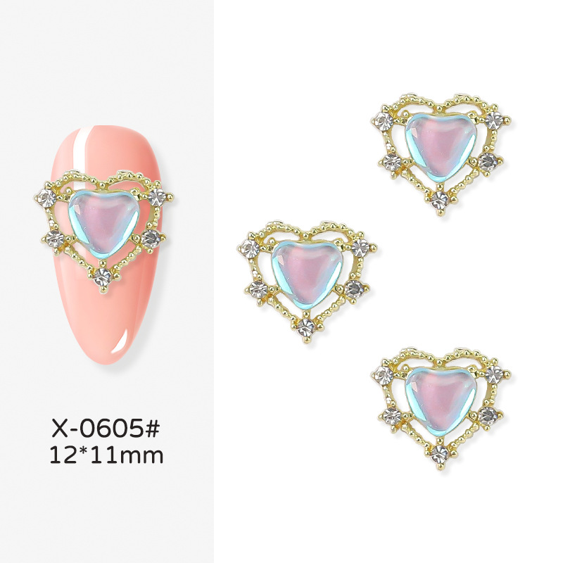 Nueva joyería de uñas Rojas netas Nueva Aurora en forma de corazón de diamantes de oro y plata Corazón de melocotón Diamante grande linda chica bonita yema de los dedos decoraciones