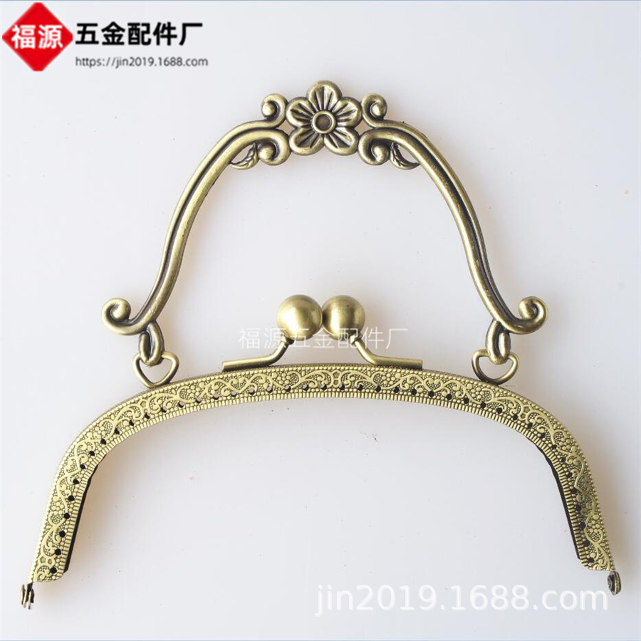9折 16.5cm弧形压花提手口金  梅花手挽D扣口金配件批发