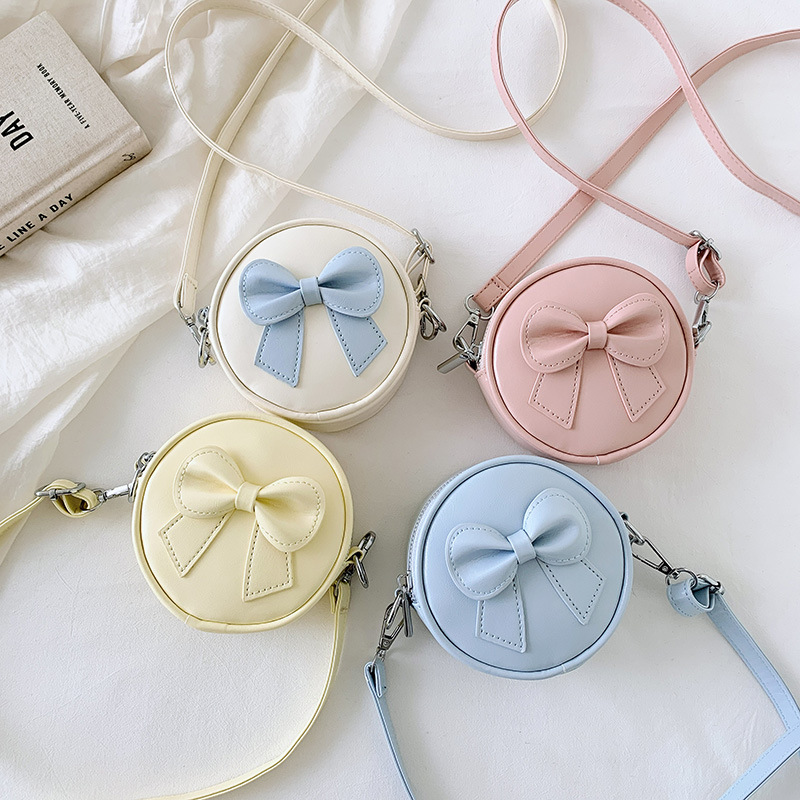 Hermosa bolsa de hombro para chicas de arco, mini bolsa de bebé simple de color sólido, bolsa de cambio para niños de moda