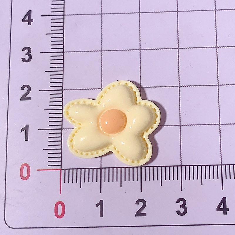 Pequeño tamaño diy flor de dopamina accesorios de resina crema para el cabello taza de agua pegada agujero zapatos colgantes hechos a mano al por mayor