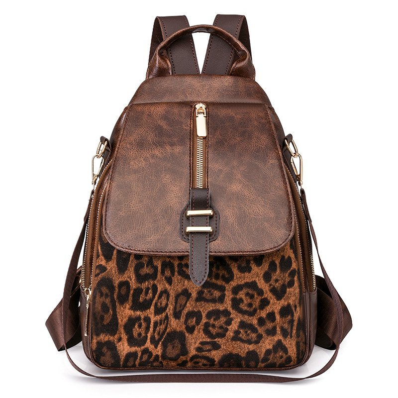 2025 primavera nuevo comercio exterior retro mochila casual impresión de tendencia de contraste de color moda al aire libre versátil gran capacidad