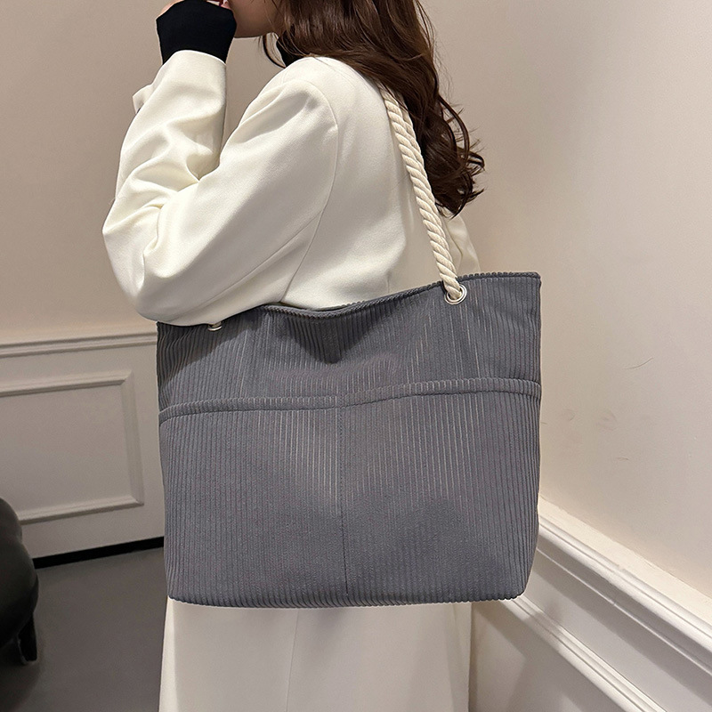 Diseño original Bolso Tote de gran capacidad para viajeros japoneses Bolso de hombro simple para estudiantes de color sólido literario casual