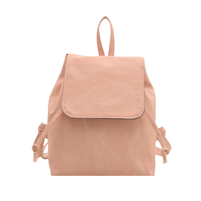 Mochila pequeña e retro ins estilo occidental mujer 2025 primavera nueva mochila de costura literaria simple y ligera