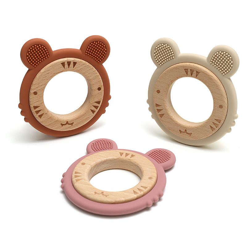 よく売れている木の輪のシリカゲルの赤ちゃんの歯のゴムのかわいいトラの赤ちゃんはおもちゃの赤ちゃんの歯のゴムの現物をなだめます。|undefined