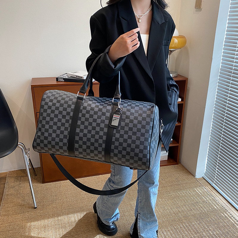 Bolsa de viaje nuevo Tablero de tela escocesa bolsa de viaje de gran capacidad bolsa de almacenamiento bolsa de equipaje bolso crossbody impermeable al por mayor