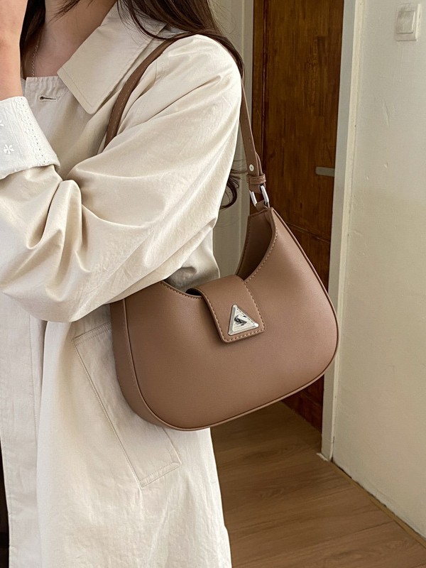 Bolsas para mujeres 2026 nuevo nicho francés de estilo transfronterizo bolsas de media luna alta sensación de lujo ligero viaje al trabajo bolsas de hombro bajo la axila