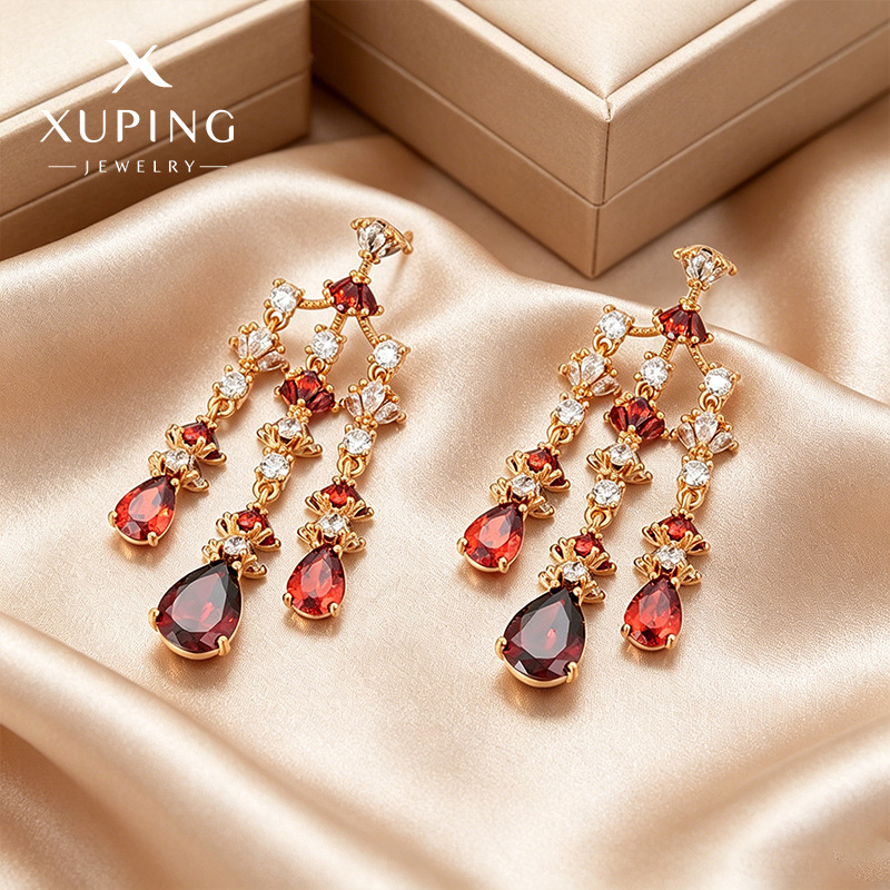 Xuping serie de aretes ligeros de lujo y elegancia de aleación de cobre chapado 18k aretes de gota de agua al por mayor para mujeres