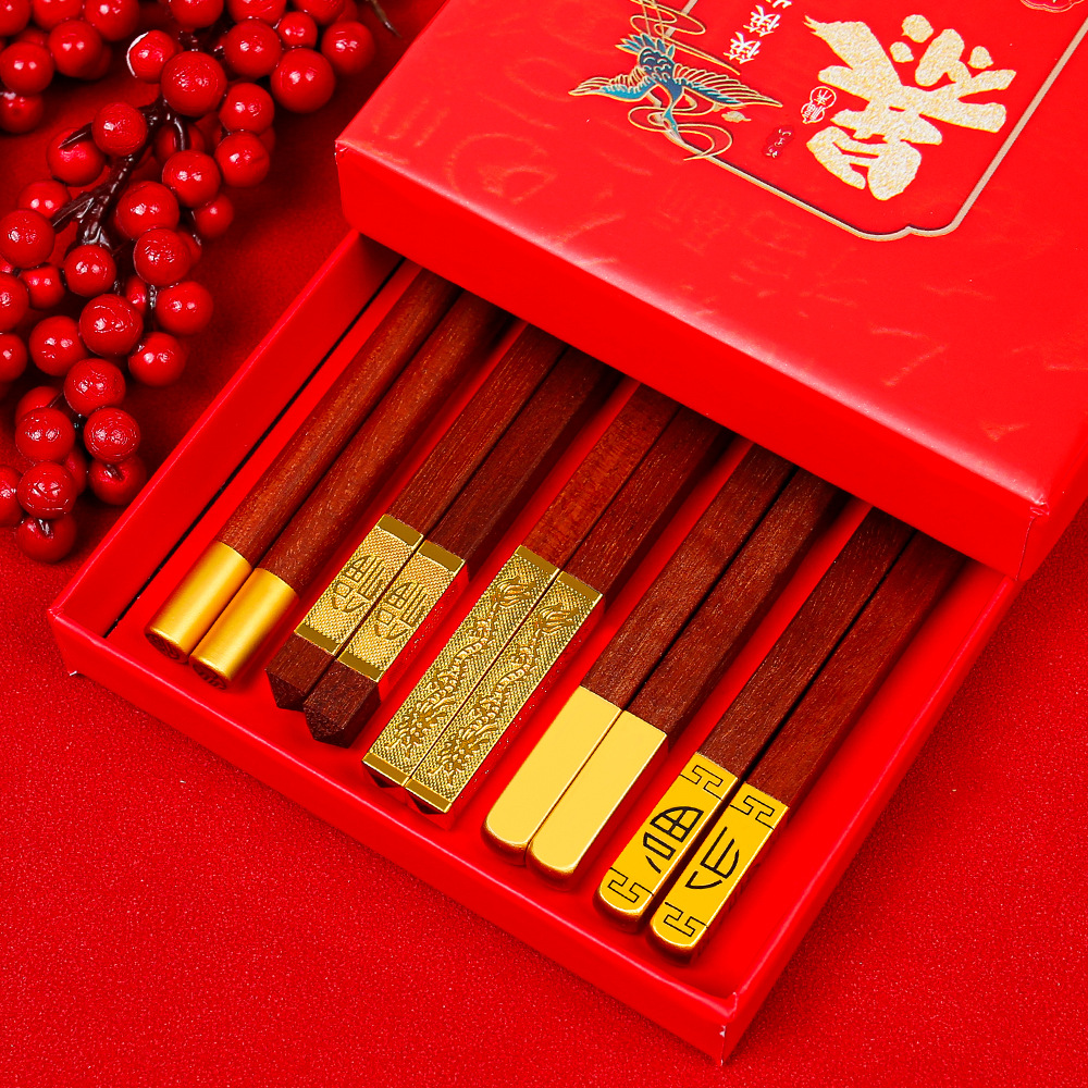 Palillos de Año Nuevo Palillos de madera de ala de pollo Palillos de madera maciza sin pintura y sin cera Comidas domésticas Una persona, una persona, palillos, caja de regalo para la riqueza