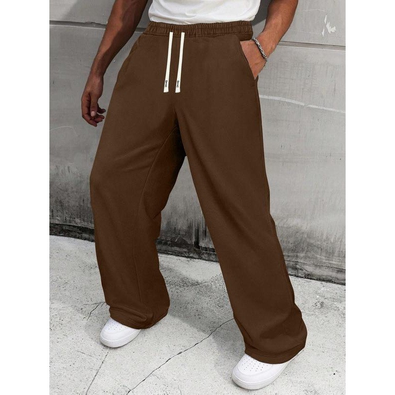 Pantalon de survêtement homme uni à jambes larges, coupe ample et décontractée, cordon de serrage, style sportif, jambes droites._voghion.com