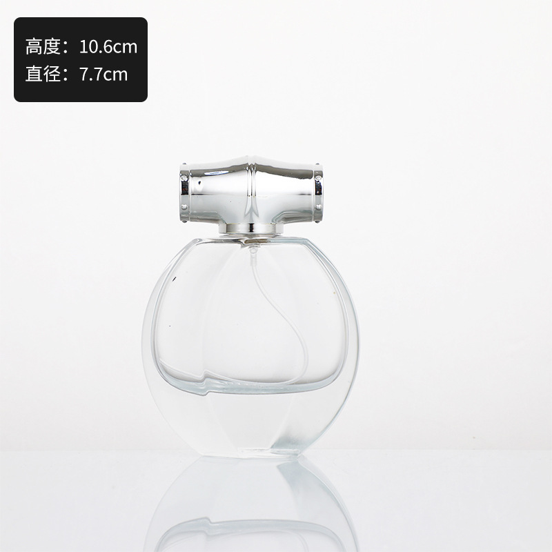 Botella de perfume de vidrio de alta calidad de 50ml botella vacía de marca con botella de aerosol de aceite esencial botella de cosméticos